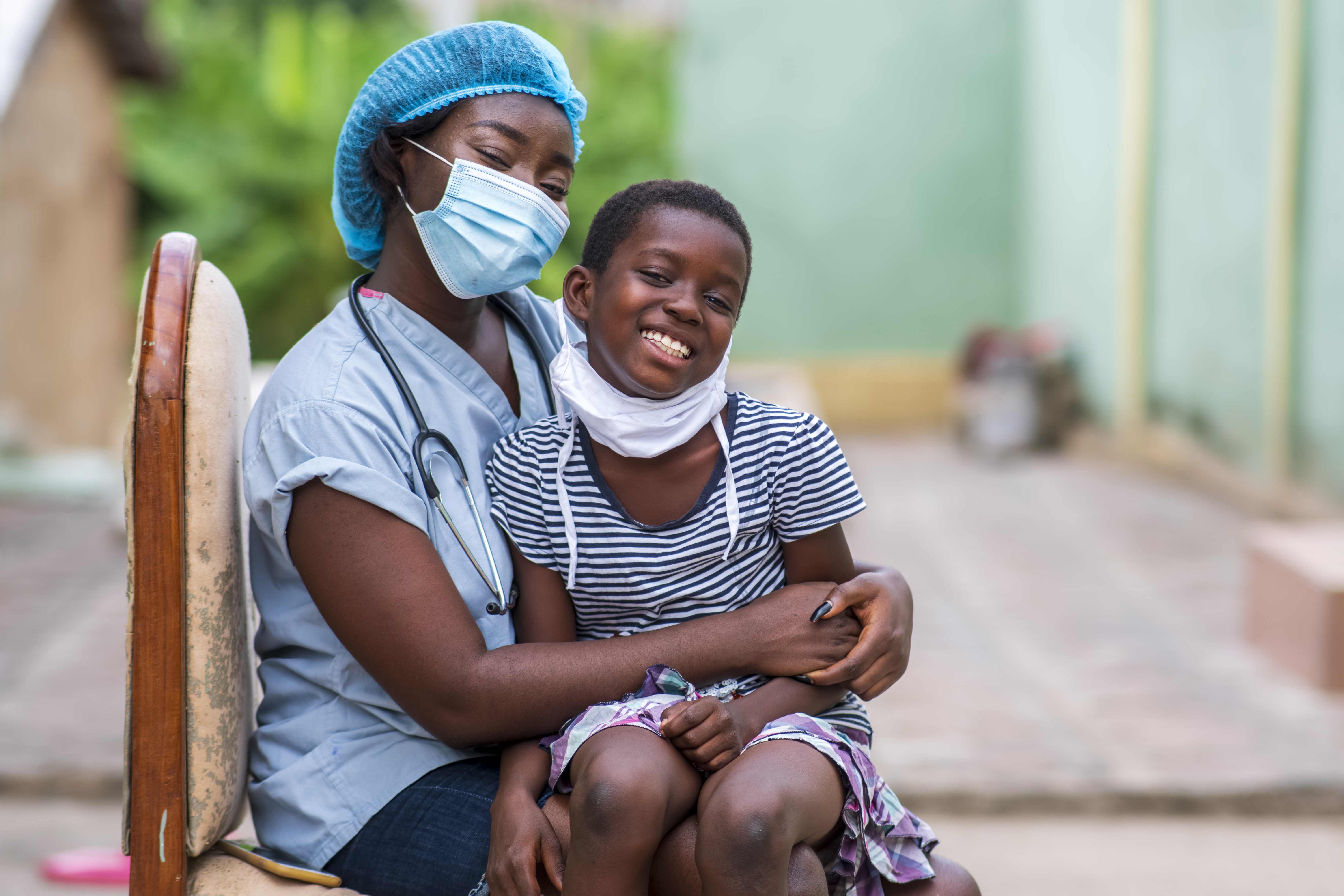 Community members receiving medical aid and care